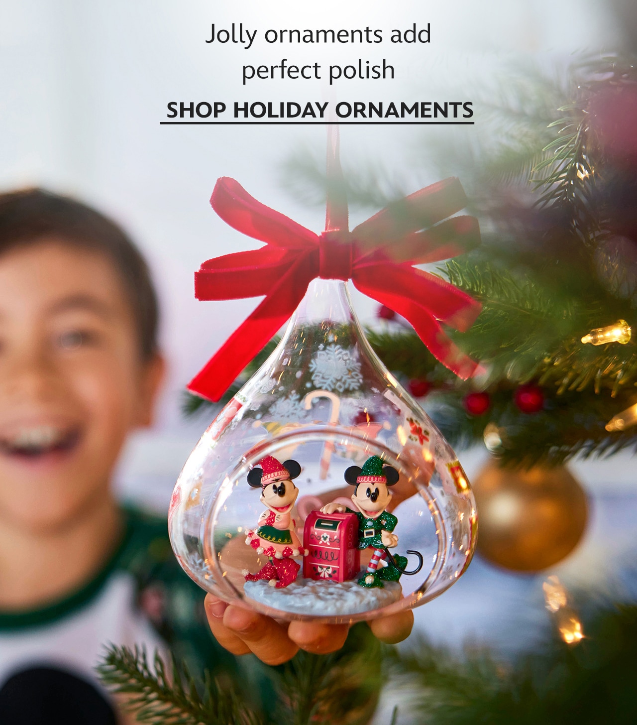 Jolly ornaments add perfect polish. | Shop Holiday Ornaments